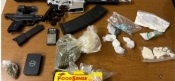 Suspects Arrested For An Illegal Weapon and Narcotics