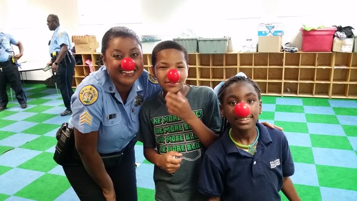 NOPD Rocks Red Noses to Fight Childhood Poverty