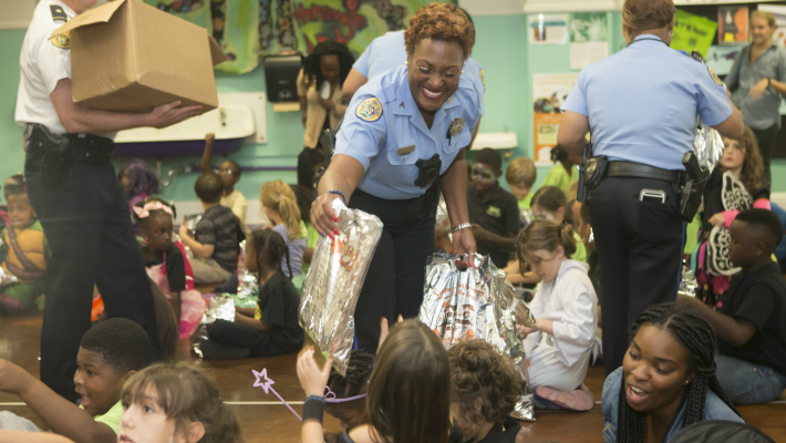 NOPD Officers Give Away over 600 Bags of Halloween Candy to New Orleans Students Today