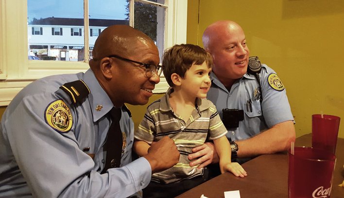 Residents Break Bread, Barriers with Fourth District Officers