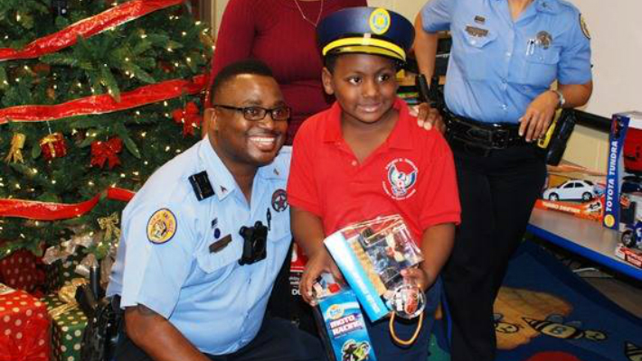 Fifty Students Get Early Christmas Present From Fourth District Officers