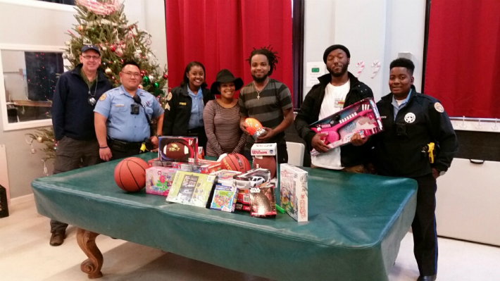 Sixth District Officers Deliver Toys To Students at Nearby Youth Empowerment Project